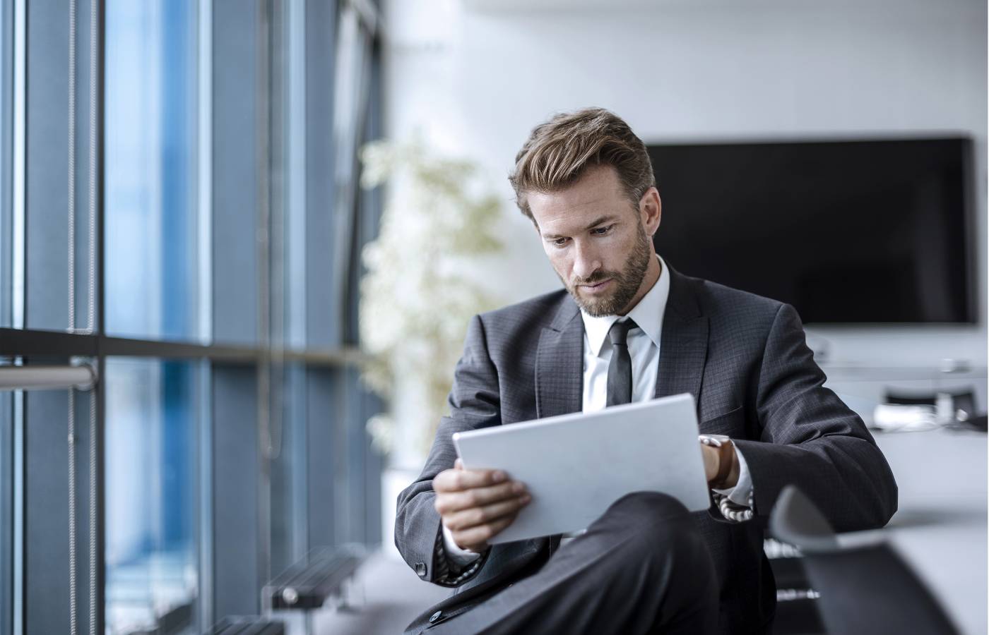 Businessman using a tablet in an office